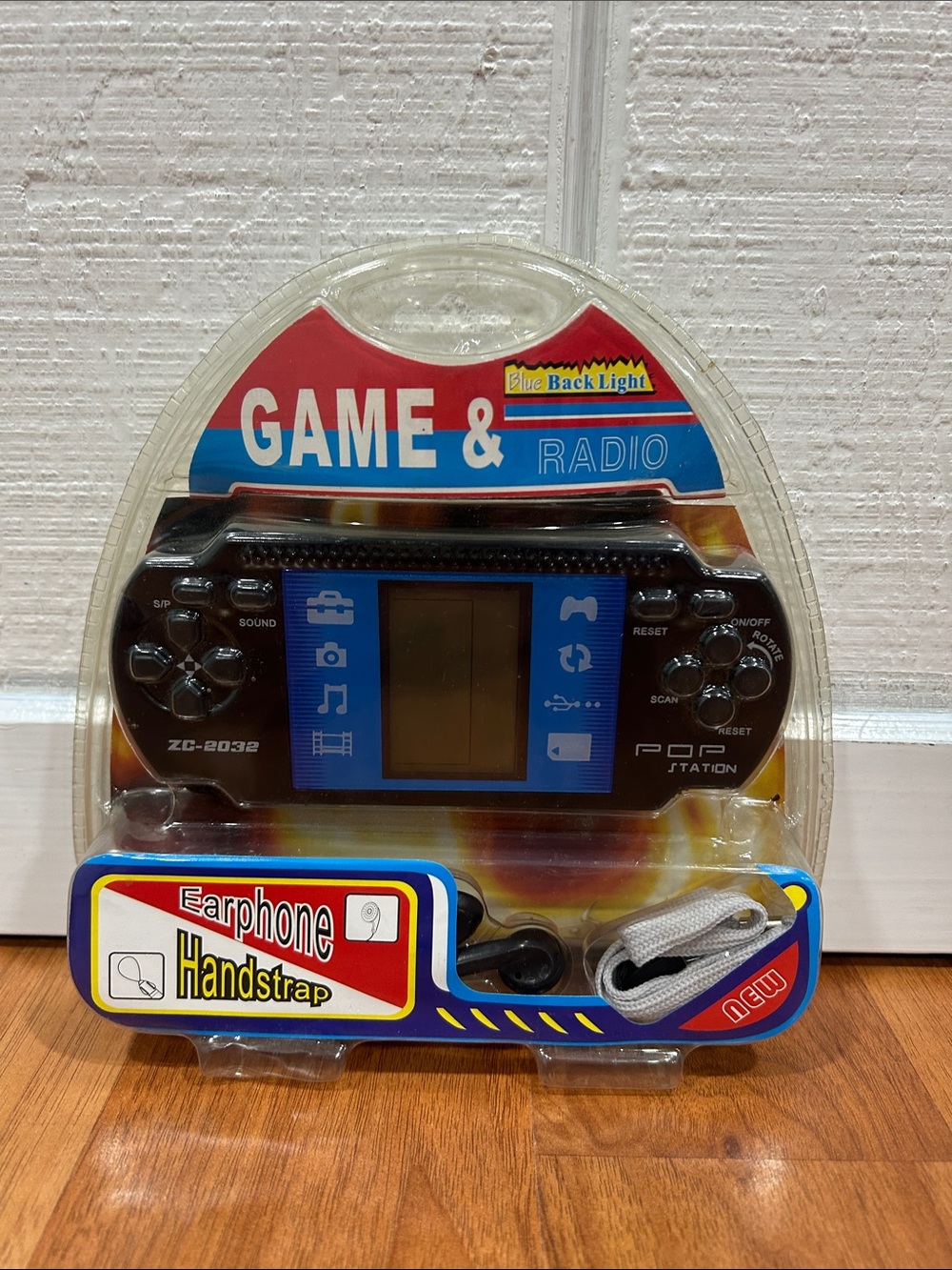 Portable Handheld Game & Radio - Black with Blue Accents